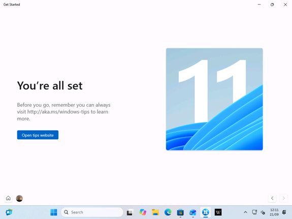The final Assisted Setup page links to MS’s Windows tips website