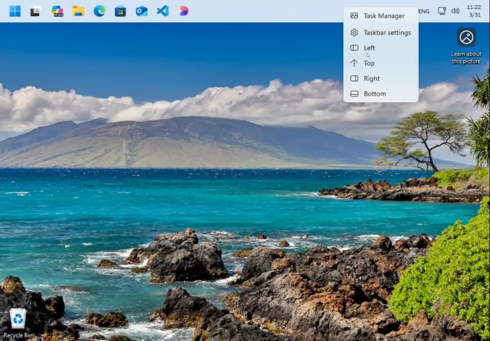 Windows 11 taskbar positioned at the top of the screen